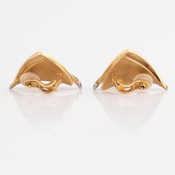 A pair of 18K gold Ole Lynggard earrings set with round brilliant-cut diamonds.