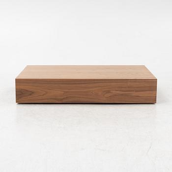 A 'Mass Wide' walnut veneered coffee table from New Works.