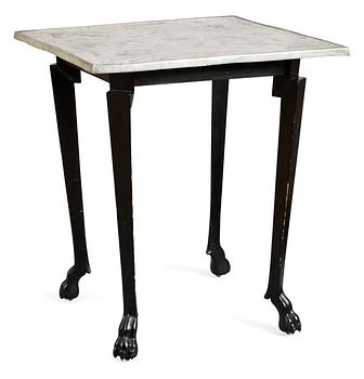 An Anna Petrus table, Stockholm circa 1922; pewter top and black wooden legs.