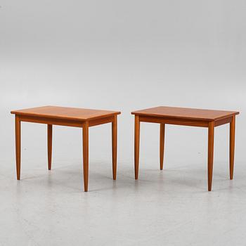 A pair of teak veneered side tables, second part of the 20th Century.