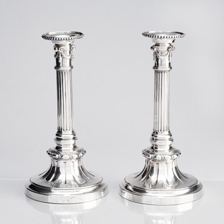 A Swedish pair of Gustavian 18th century silver candelsticks, marks of Pehr Zethelius, Stockholm 1779.