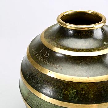A Swedish Art Deco metal vase.