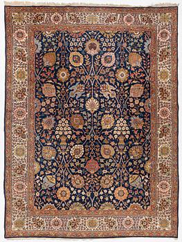 A semi-antique Tabriz carpet, c. 395 x 295 cm.