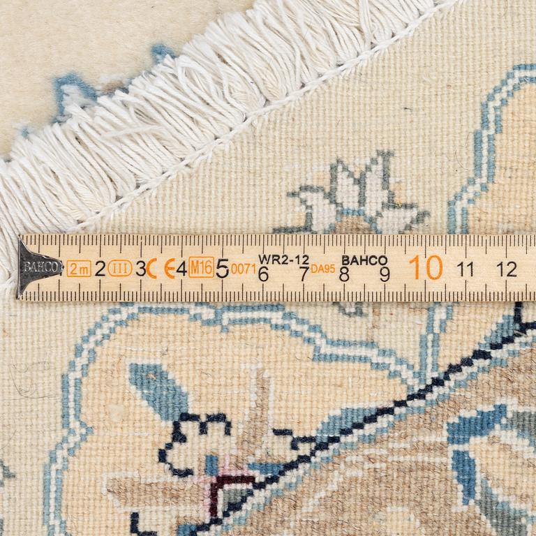 A Nain rug, diameter a. 247 cm.