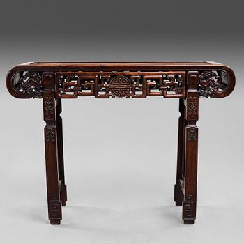 353. A hardwood altar table, early 20th Century.