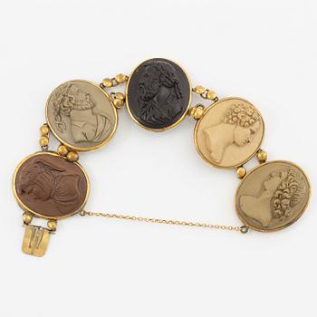 Bracelet, gilded metal with carved lava cameos, 19th/20th century.