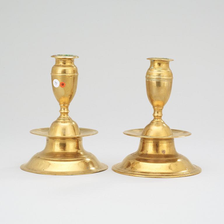 Two matched circa 1700 baroque candlesticks.
