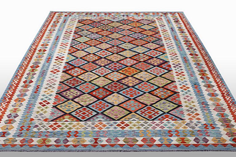 A carpet, kilim 343 x 250 cm.