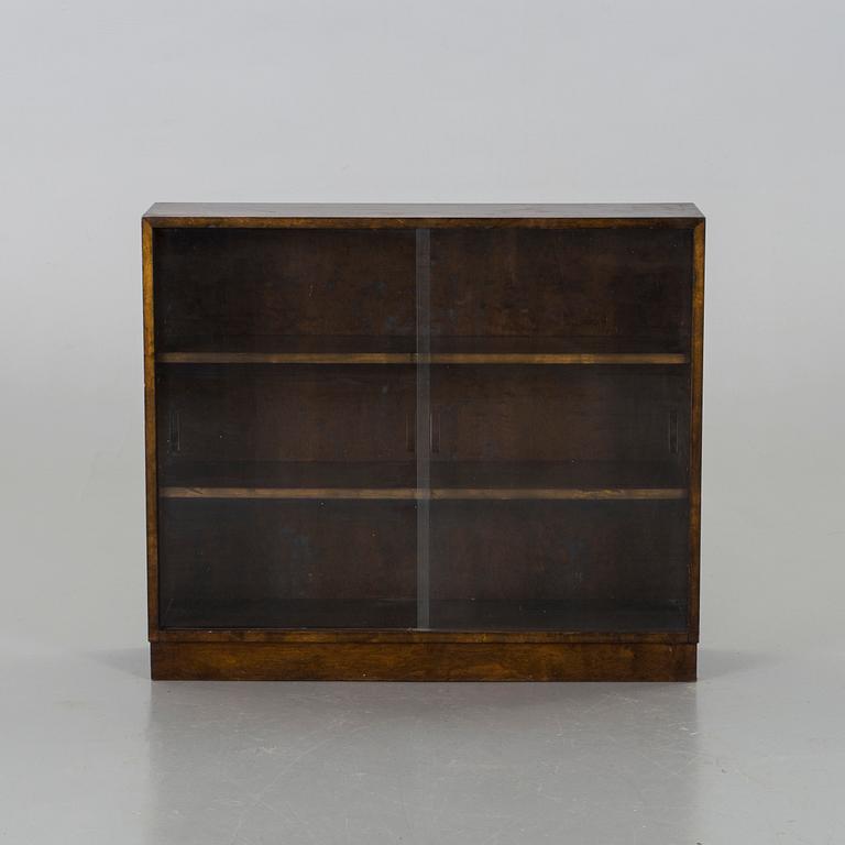 A 1930'S BOOK SHELF.