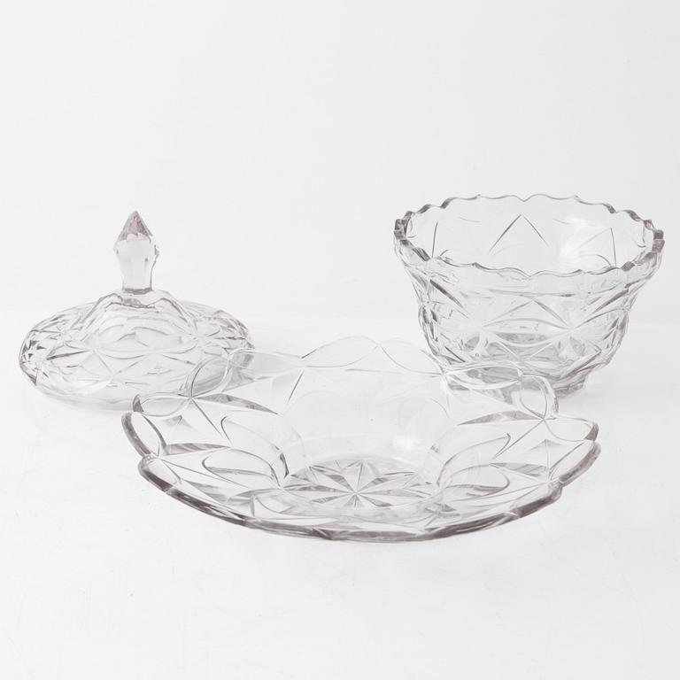 A pair of lidded glass bowls with stands, late 19th century.