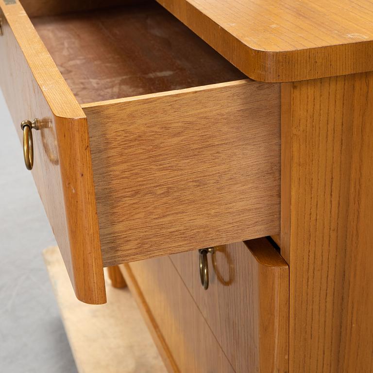 An elm wood veneered dresser, mid 20th Century.