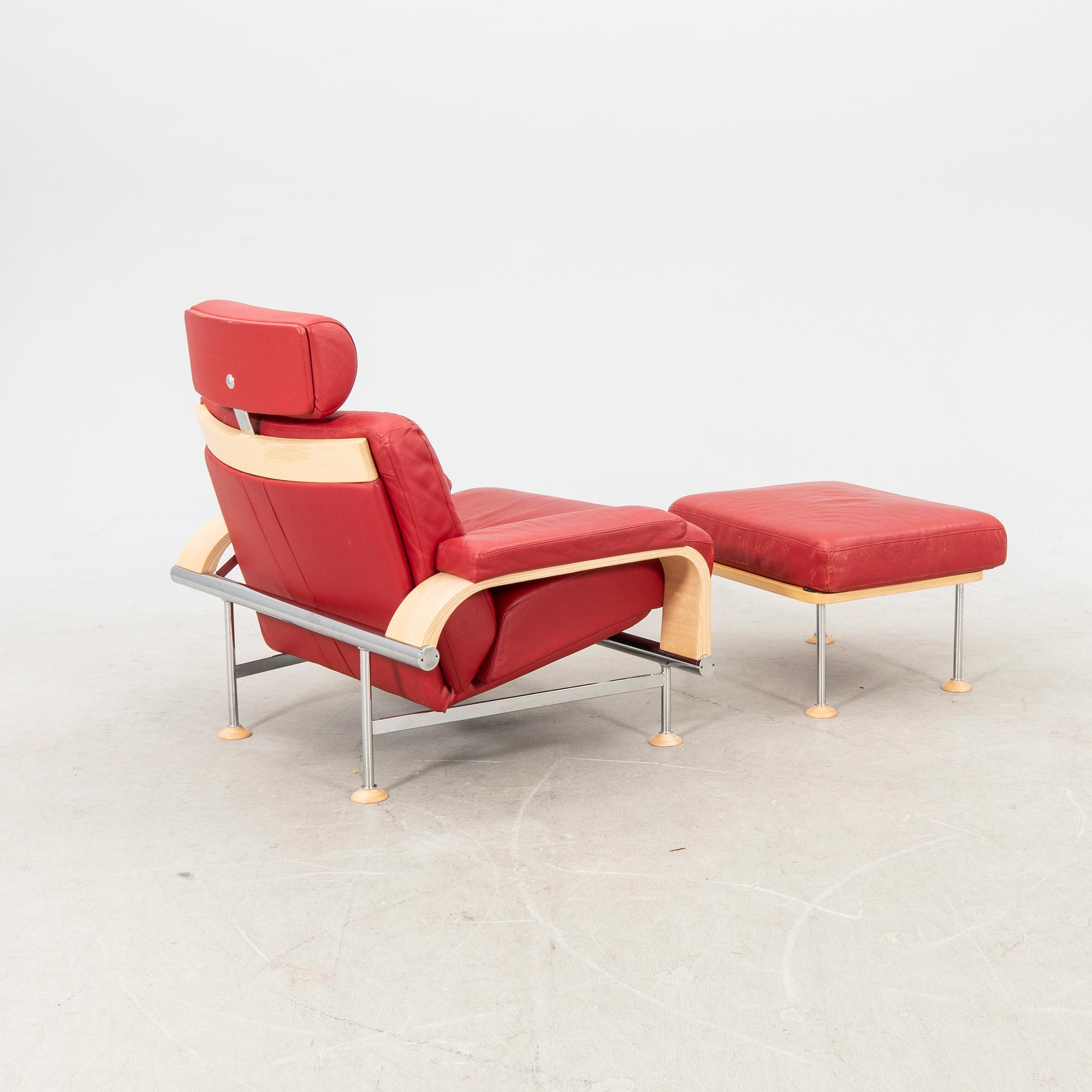 A Folke Fribyter leather armchair and fotstool 'Leo' from Nelo Knislinge around year 2000.