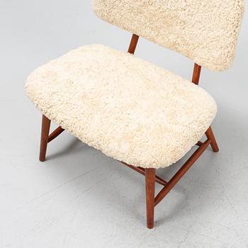 Alf Svensson, a 'TeVe' easy chair, with new sheepskin upholstery. Bra Bohag, Studio Ljungs Industrier, 1950's.