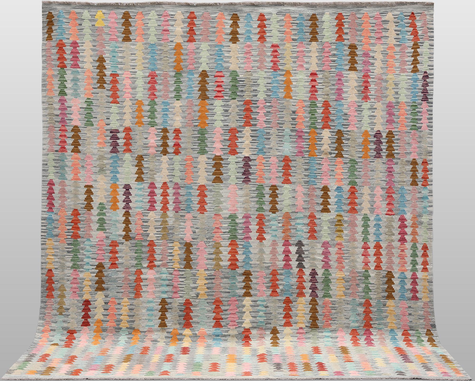 A Kilim rug, approx. 294 x 252 cm.