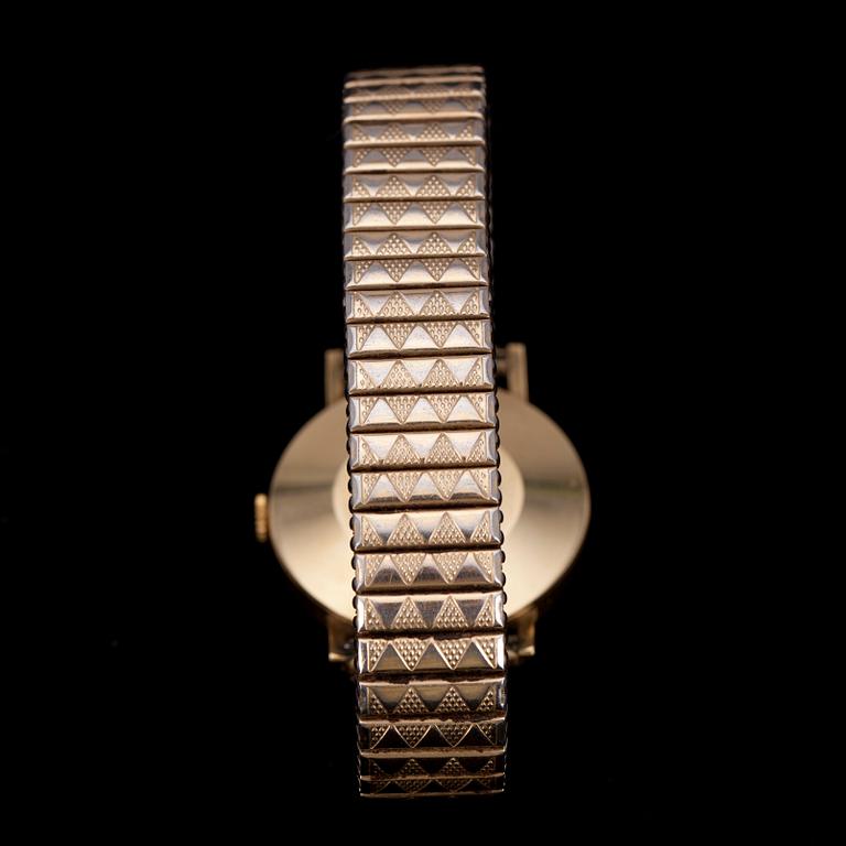 ARMBANDSUR. 14 K. Revue automatic. Shell 1971.