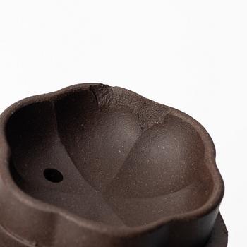 Two similar 'magnolia flower six-petal' yixing teapots, China, 1980s.