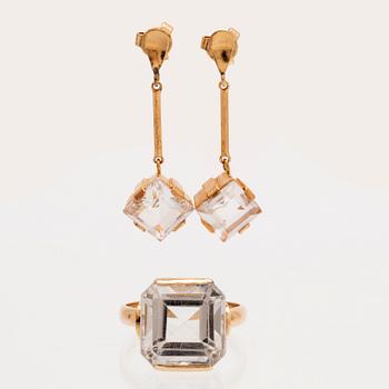 Ring och örhängen 18K guld samt fasettslipade bergskristaller.