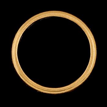 RING, 23K guld. Vikt ca 7 g.