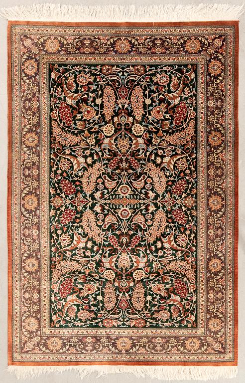 Ghom silk rug on silk, signed Nejad Torabi 1391, approximately 146x99 cm.