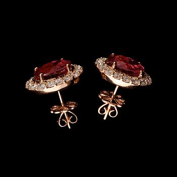 A pair of toumaline, circa 5.69 cts, and diamond, total circa 1.53 cts, earrings.