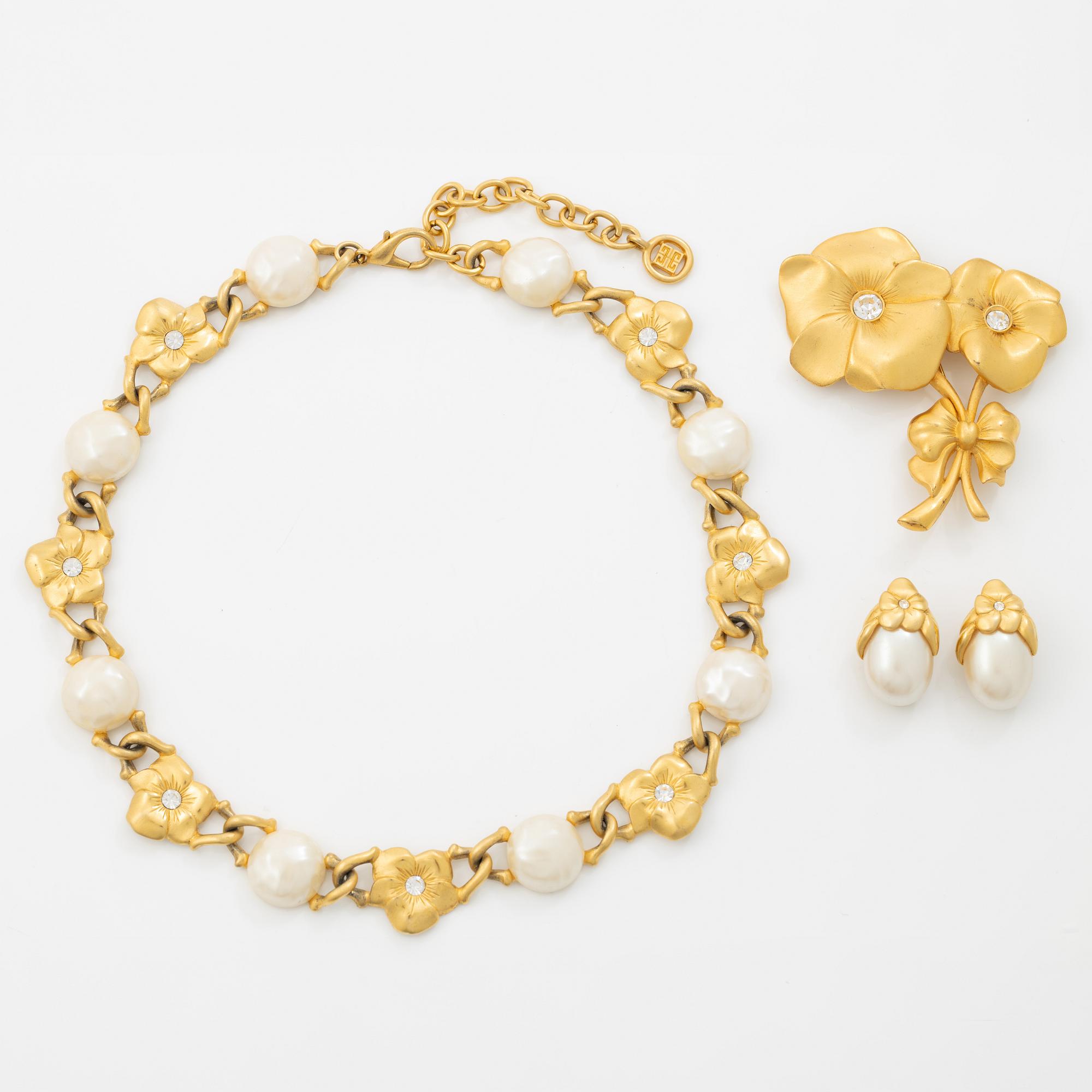 Givenchy, necklace, earrings and brooch.