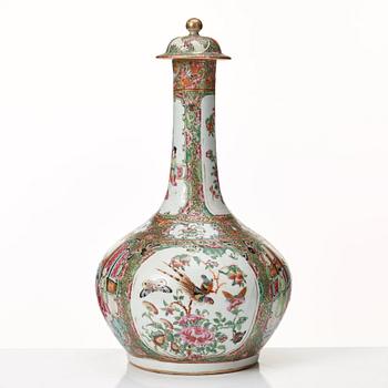 A Canton famille rose vase with cover, Qing dynasty, late 19th Century.