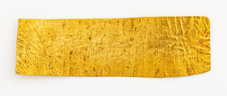 A set of nine presumably modern Egyptian-style gold foil sheets with figures and hieroglyphs.