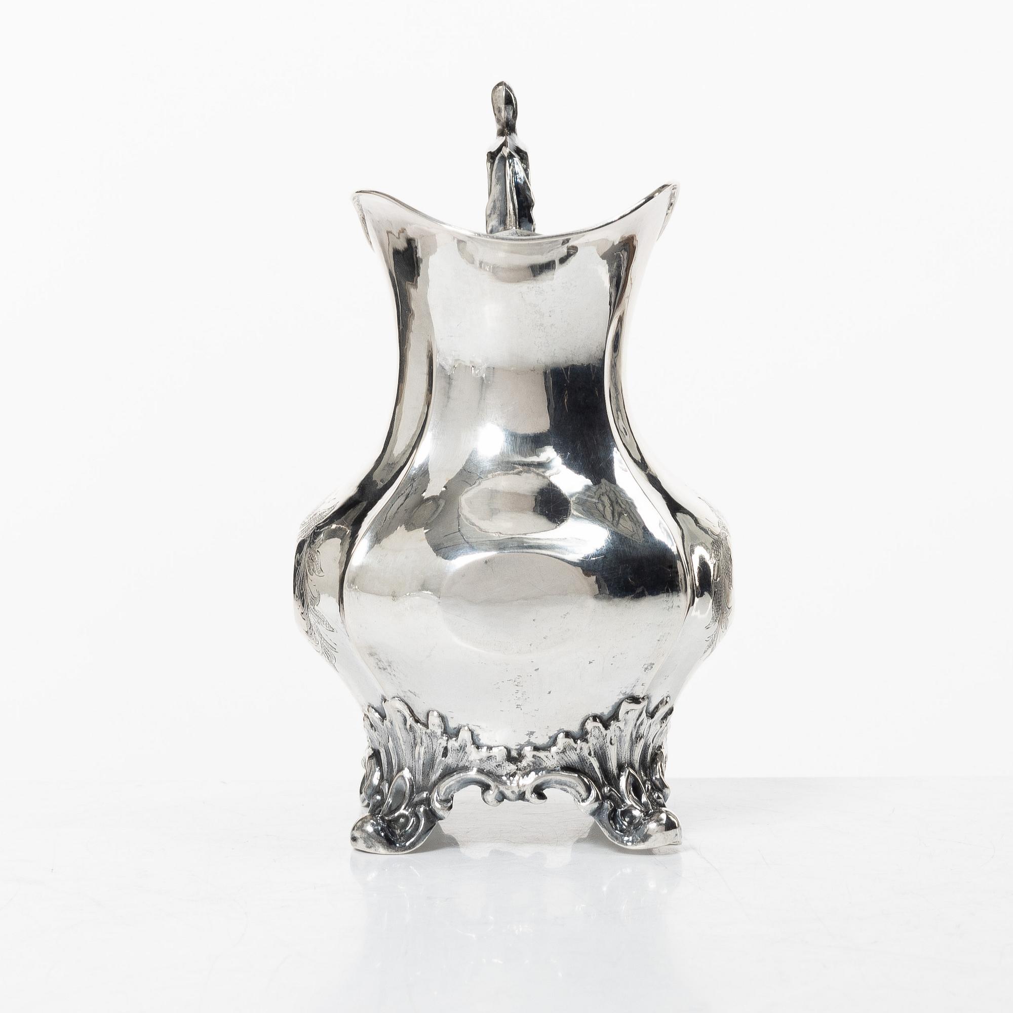 A silver soup ladle and creamer, Sweden, 1867-1905.