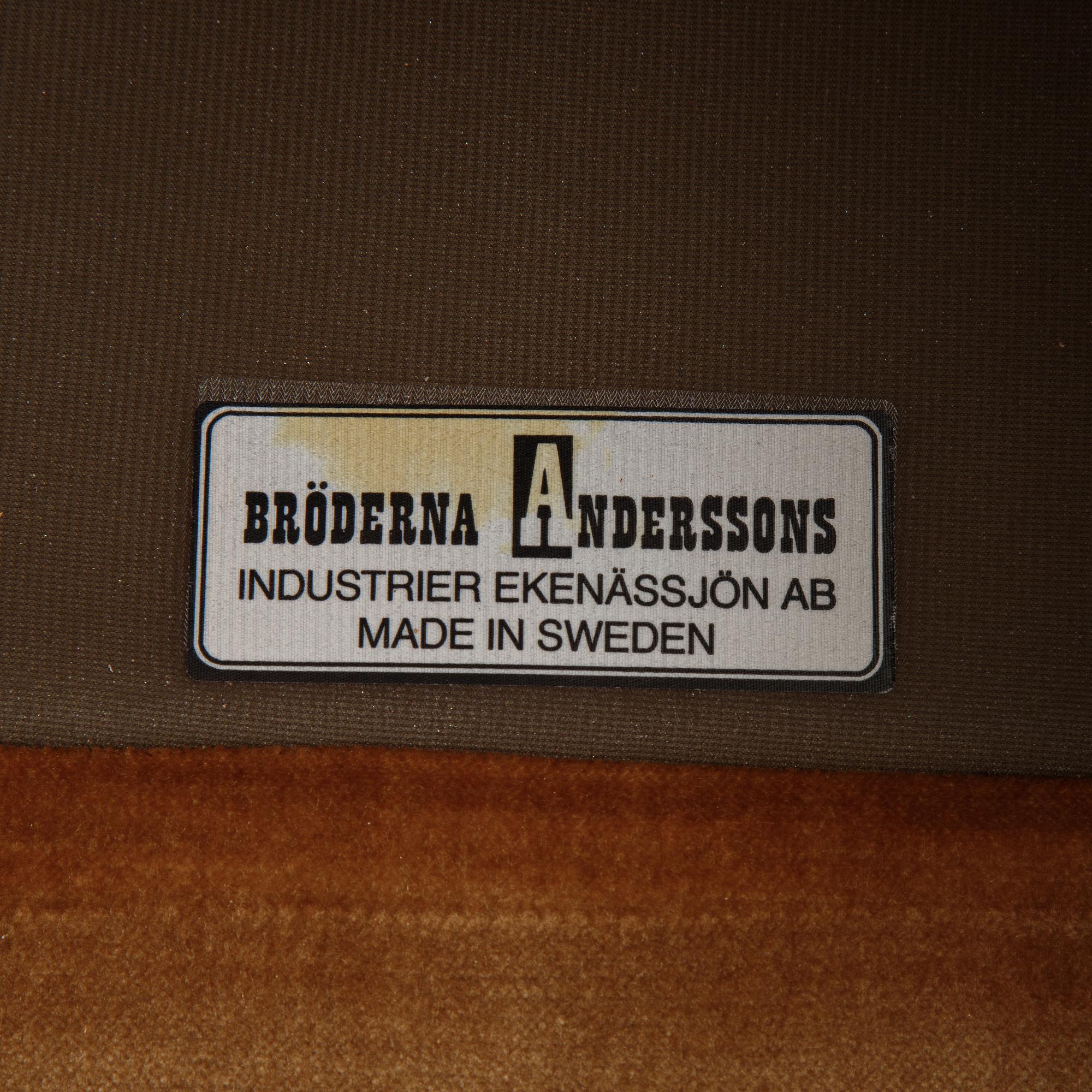 A pair of mahogany and velvet easy chairs by Bröderna Andersson, 1960's.