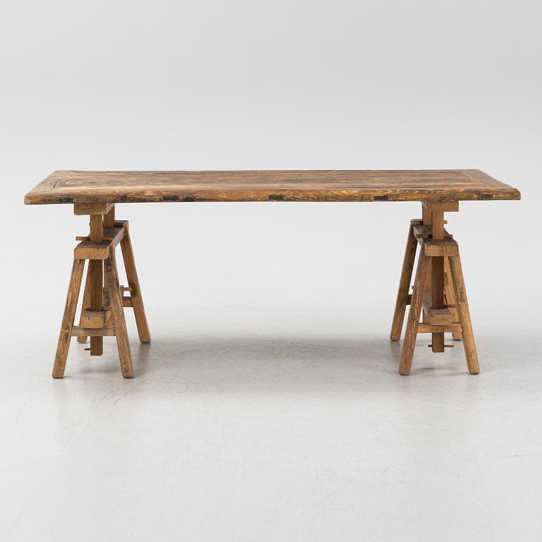 A Walles & Walles dining table.