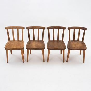 Axel Einar Hjorth, a set of 4 stained pine 'Utö' chairs, Nordiska Kompaniet, Sweden 1930s.