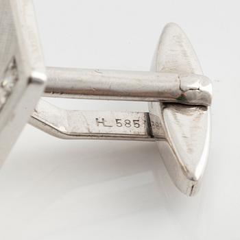 Cufflinks, a pair, white gold with brilliant-cut diamonds.