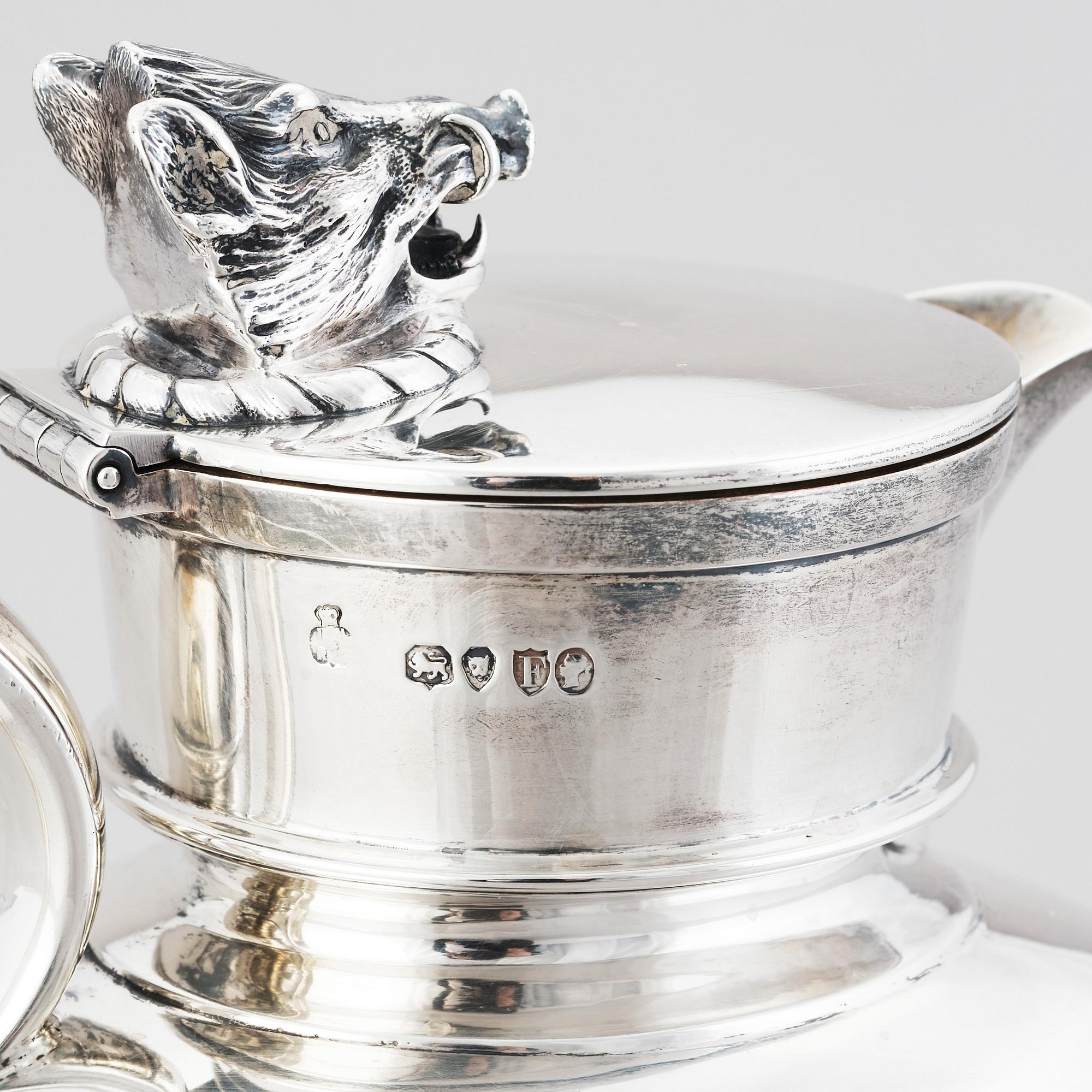 An English silver jug with lid, makers mark Hunt & Roskell Late Storr & Mortimer, London 1881.