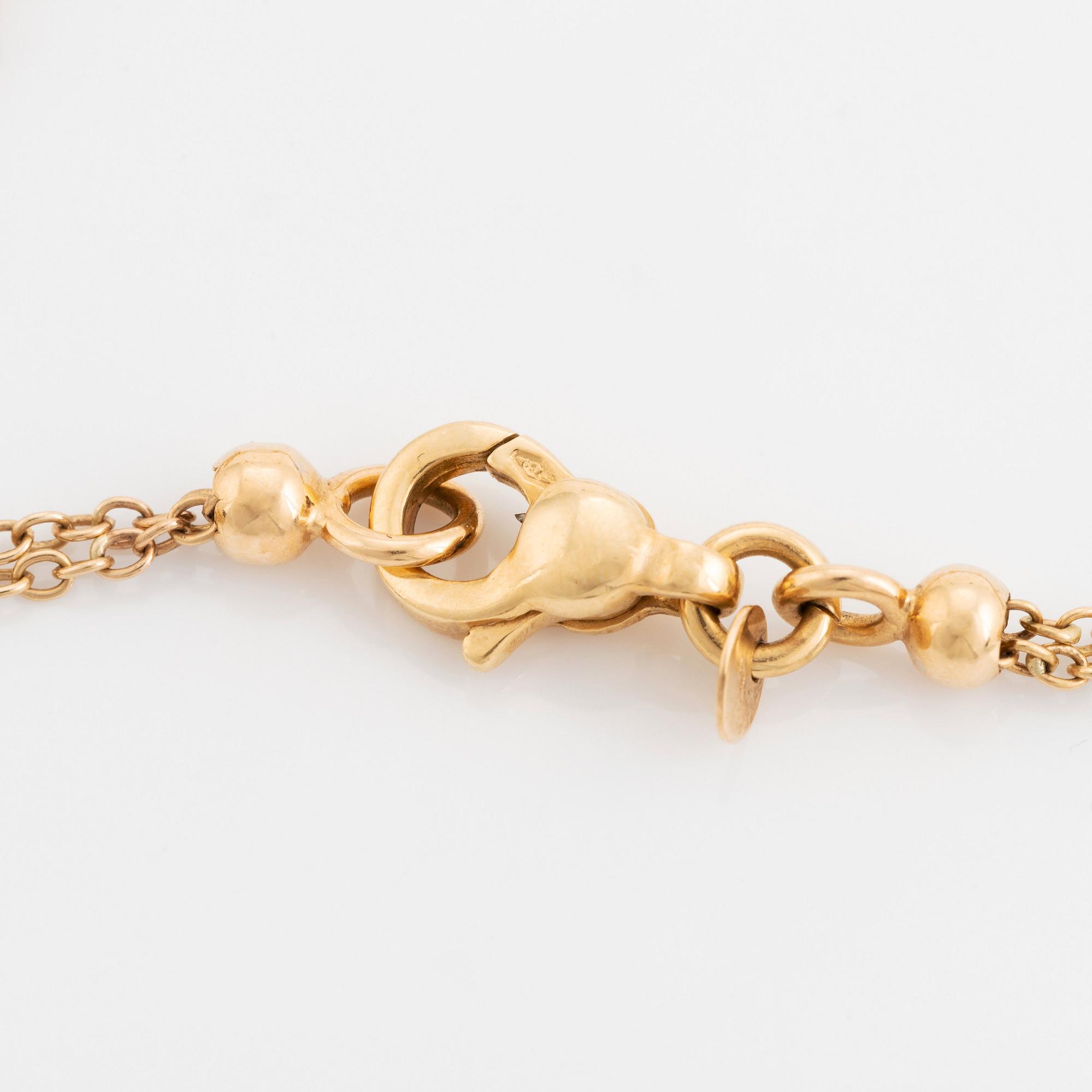 Collier 18K guld med runda briljantslipade diamanter.