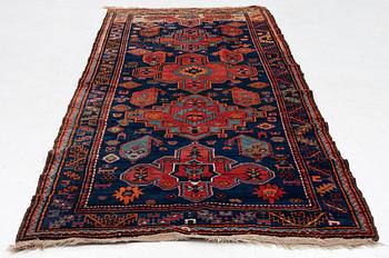 A semi-antique Anatolian rug, c. 335 x 140 cm.