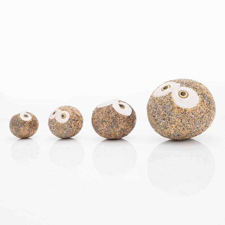 Kaarina Aho, a four piece set of stoneware figurines, signed Aho, Made In Finland.