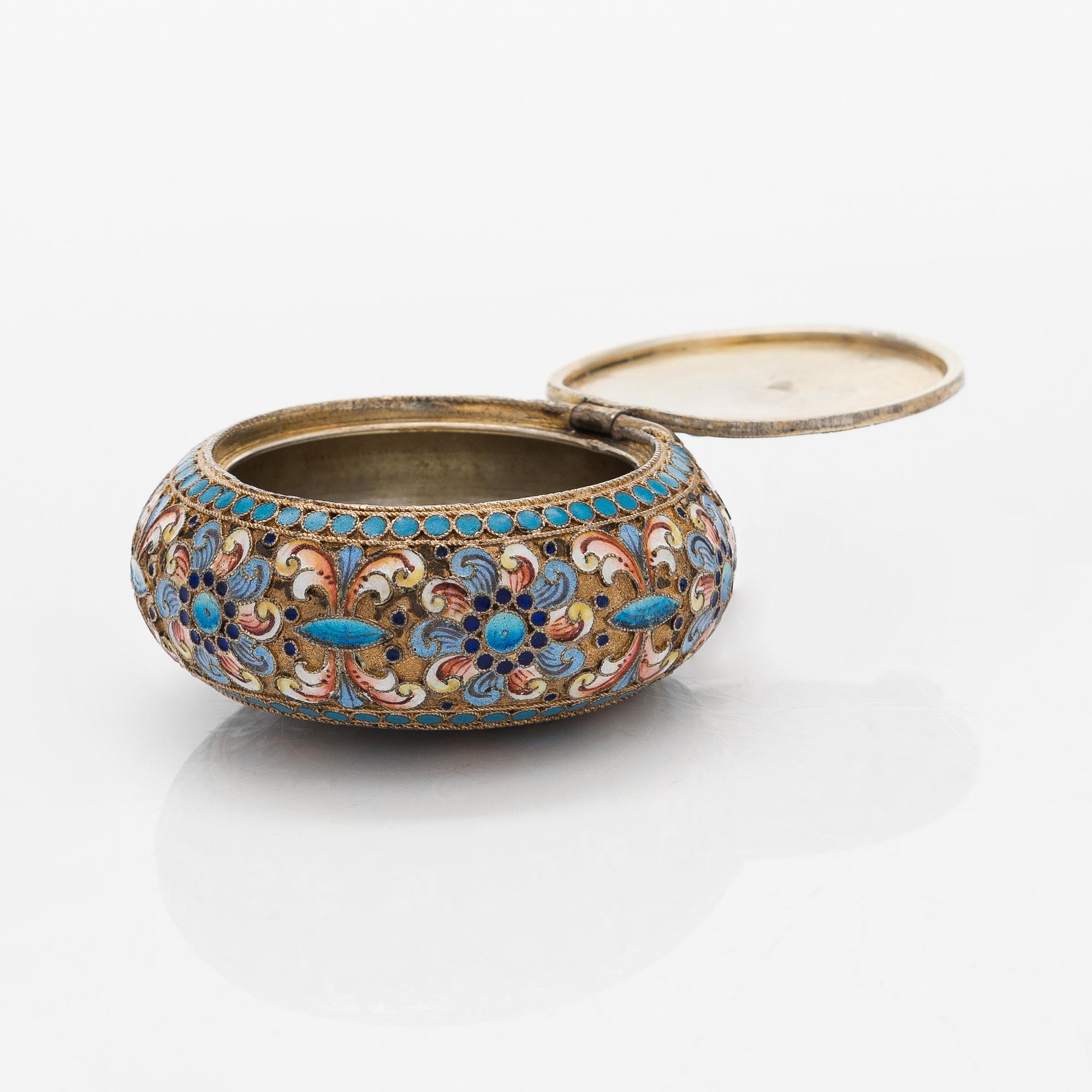 A gilt silver cloisonné enamel pill box, maker's mark of D. Nikitin, Moscow 1908-17.