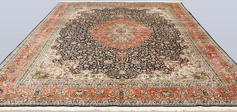 A silk carpet, Kashmir, c. 357 x 274 cm.