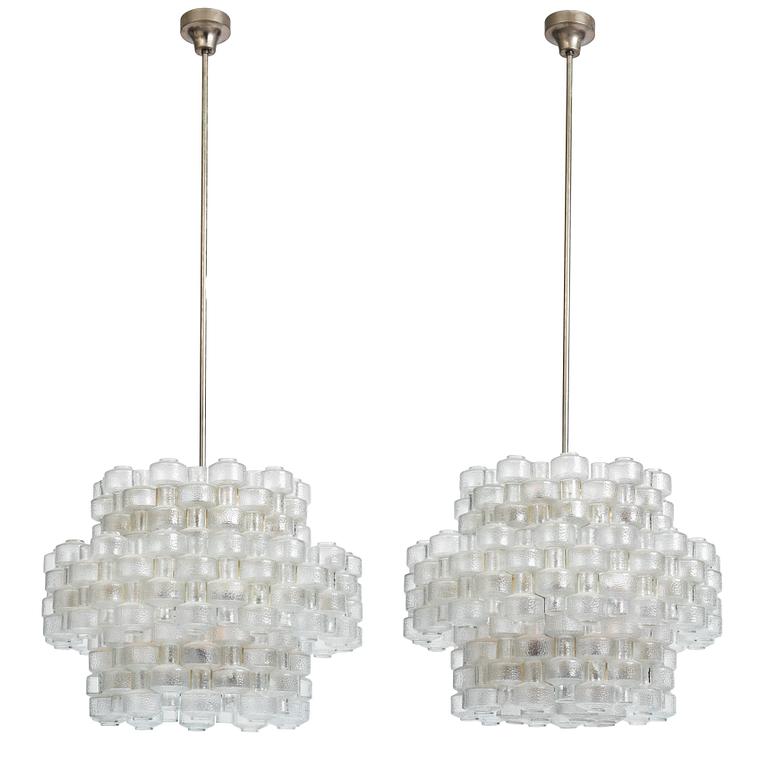 Gert Nyström, a pair of "Festival" chandeliers, Fagerhult, 1960s-70s.