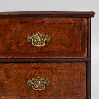 A 18th century baroque chest of drawers.