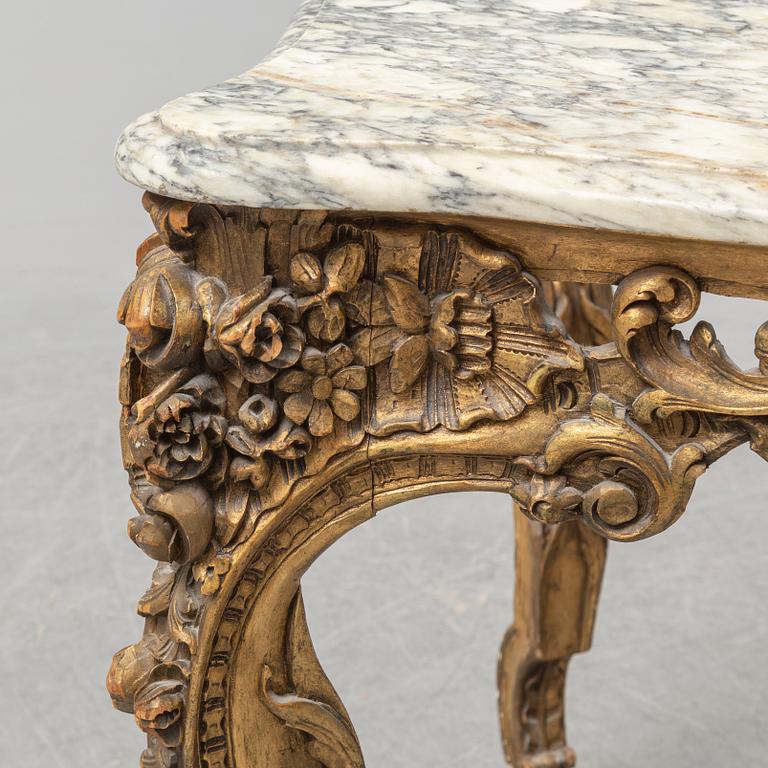 A second half of the 20th Century bronzed table with a marble top.