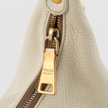 Prada, a white leather bag.