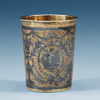 867. A Russian eraly 19th century parcel-gilt and niello beaker, marked Moscow 1804.