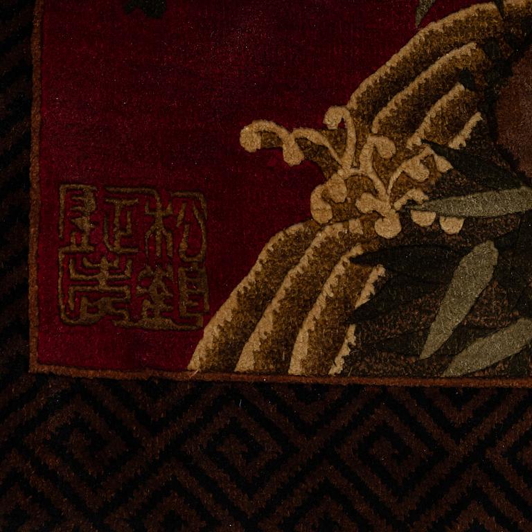 A RUG, silk China, ca 124 x 47 cm.