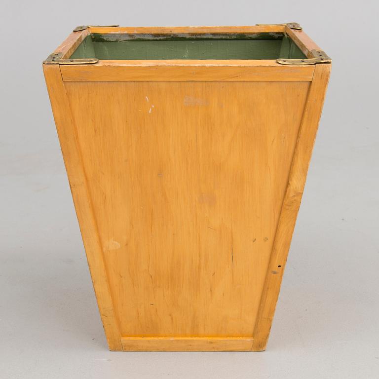 A 1930s trash can.