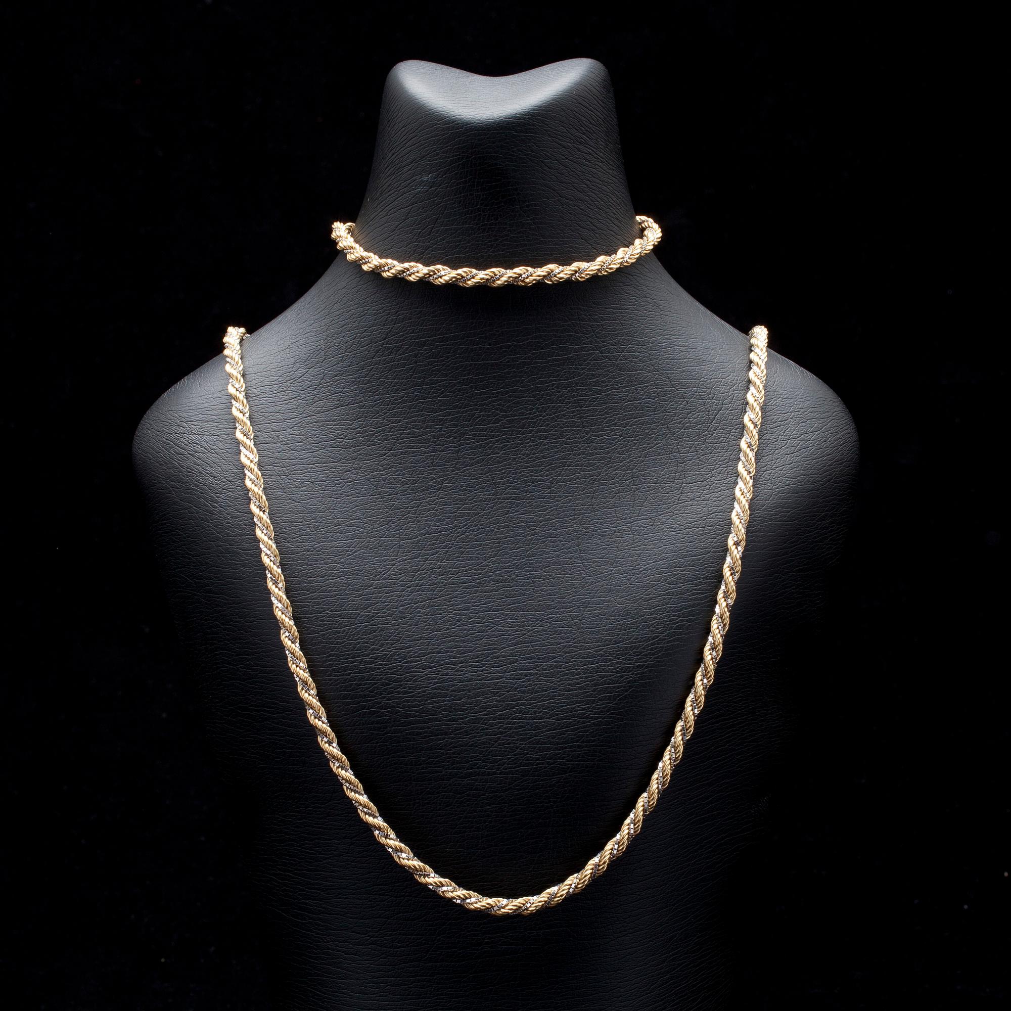 HALS- och ARMKED, tvåfärgsguld 18K, italienska stämplar. Vikt 37,9 g.