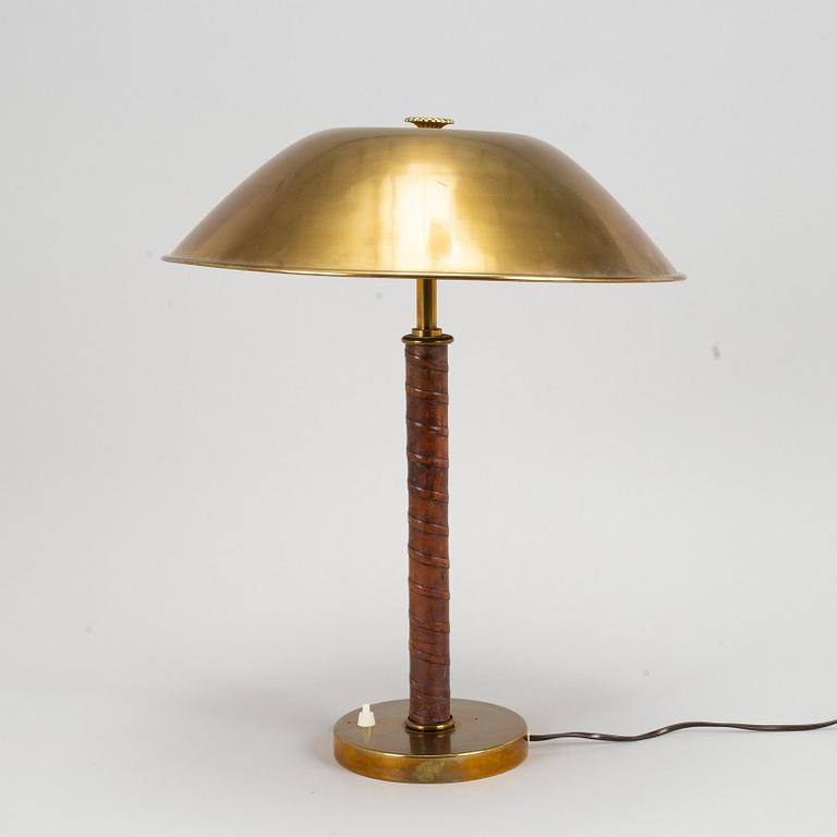 A brass table lamp from Nordiska Kompaniet, 1940's.