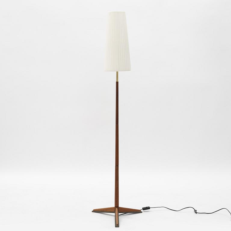 A 1960s teak floor lamp.