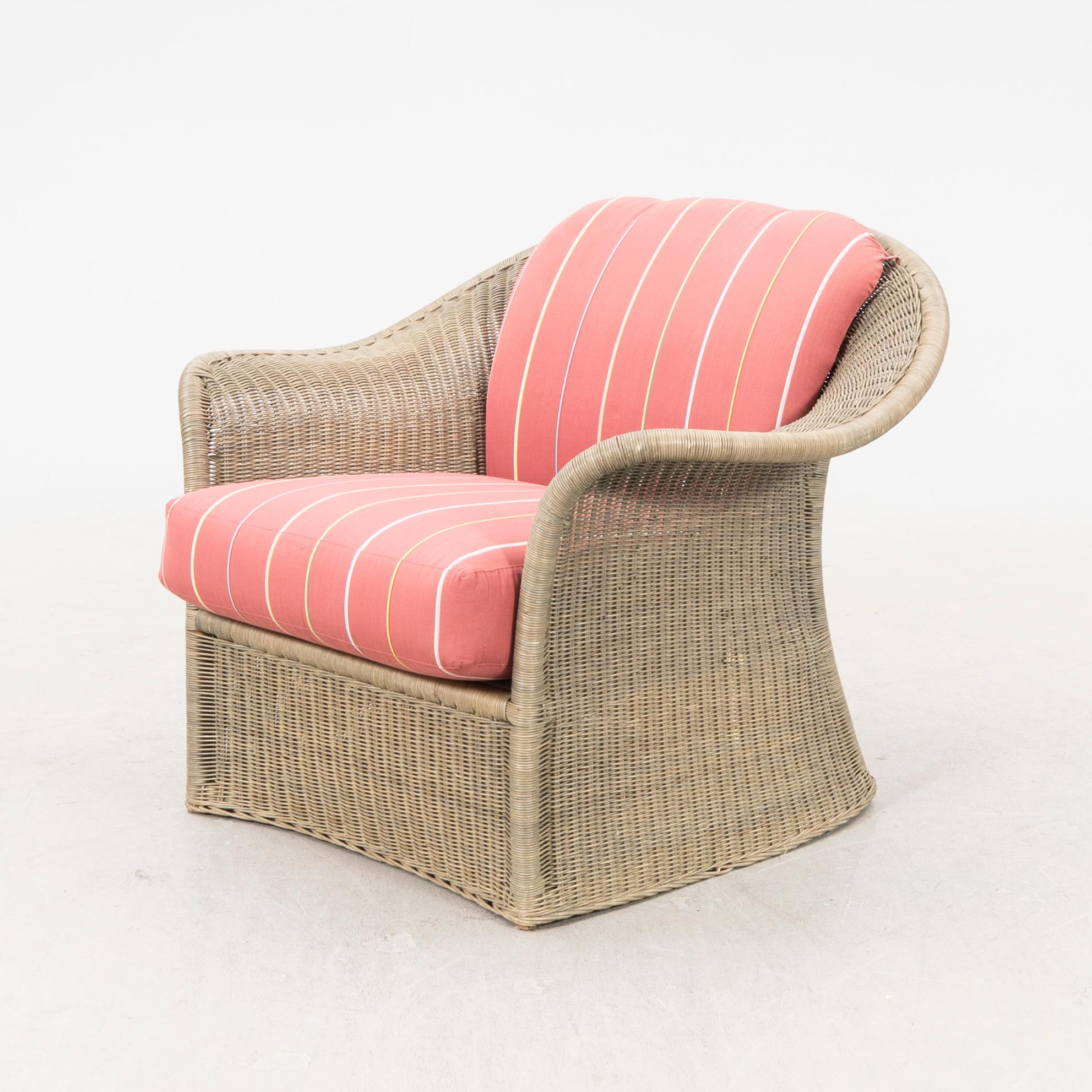A Bonacina special edition rattan armchair 21st  century.