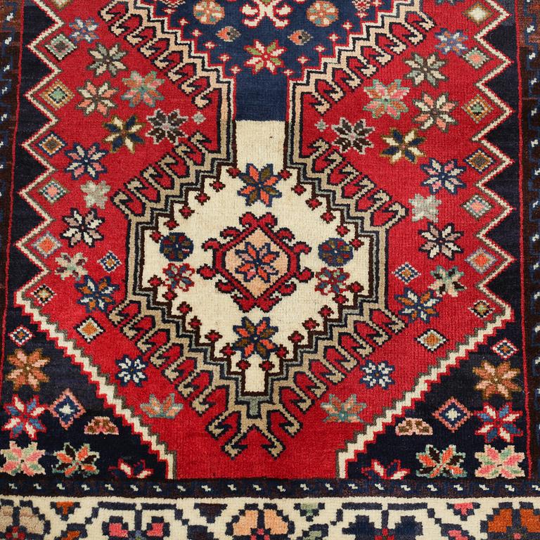 A Yalameh rug, 185 x 77 cm.